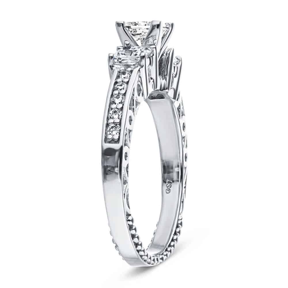 Shown with Three Princess Cut Lab Grown Diamonds Set in 14k White Gold|Vintage style three stone engagement ring with princess cut lab grown diamonds and antique style scroll detailing in 14k white gold