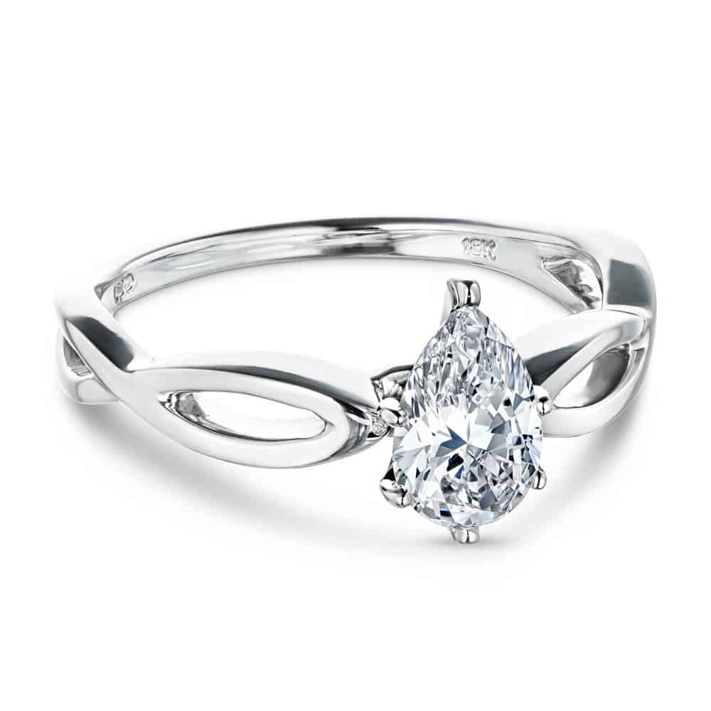 Shown with 1ct Pear Cut Lab Grown Diamond in 16k White Gold|Unique solitaire engagement ring with a 1ct pear cut lab grown diamond in twisted metal design 16k white gold band