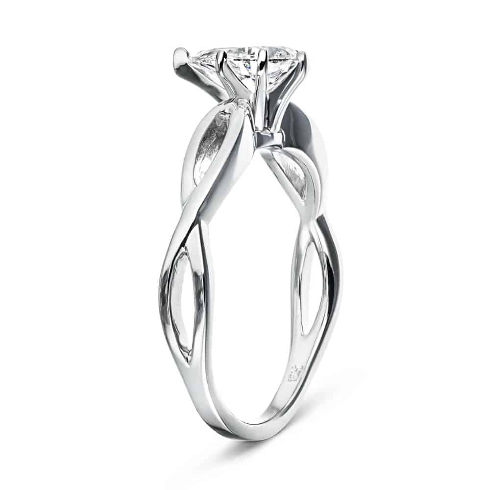 Shown with 1ct Pear Cut Lab Grown Diamond in 16k White Gold|Unique solitaire engagement ring with a 1ct pear cut lab grown diamond in twisted metal design 16k white gold band