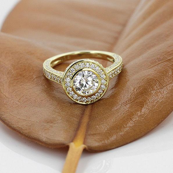 Launa Accented Engagement Ring shown with 1.25ct round cut Diamond Hybrid in 18K yellow gold 