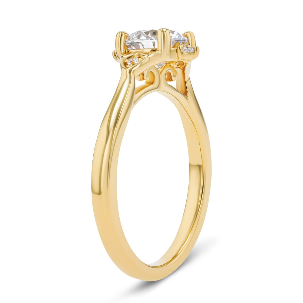 Shown here with a 1.0ct Round Cut Lab Grown Diamond center stone in 14K Yellow Gold|diamond accented engagement ring with round cut lab grown diamond center stone set in 14k yellow gold metal