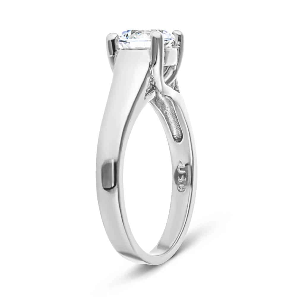 Shown with 1ct Round Cut Lab Grown Diamond in 14k White Gold|Solitaire engagement ring with wide band inspired by tiffany & co lucida engagement ring