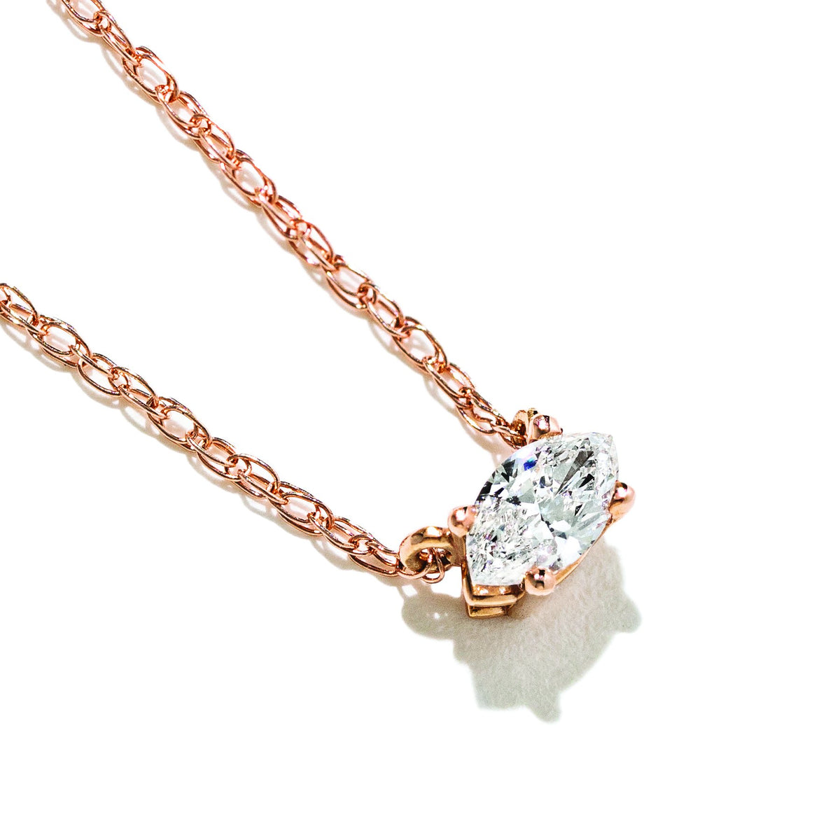 Shown here with a Marquise lab-grown diamond in rose gold 