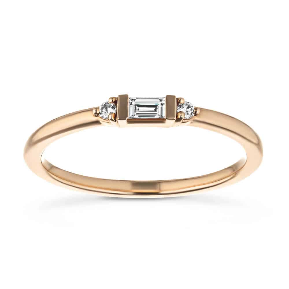 Shown with a straight baguette and round Lab-Grown Diamonds side stones in recycled 14K rose gold | fashion ring Shown with a straight baguette and round side Lab-Grown Diamonds in recycled 14K rose gold
