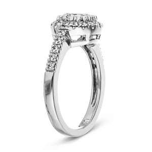 Diamond accented halo engagement ring with 1ct round cut lab grown diamond in 14k white gold shown from side