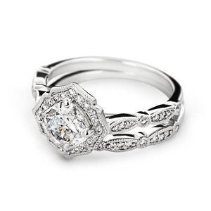  antique vintage stackable wedding set Shown with a 1.0ct round cut Lab-Grown Diamond with a diamond accented halo and filigree detailing in recycled 14K white gold with matching wedding band