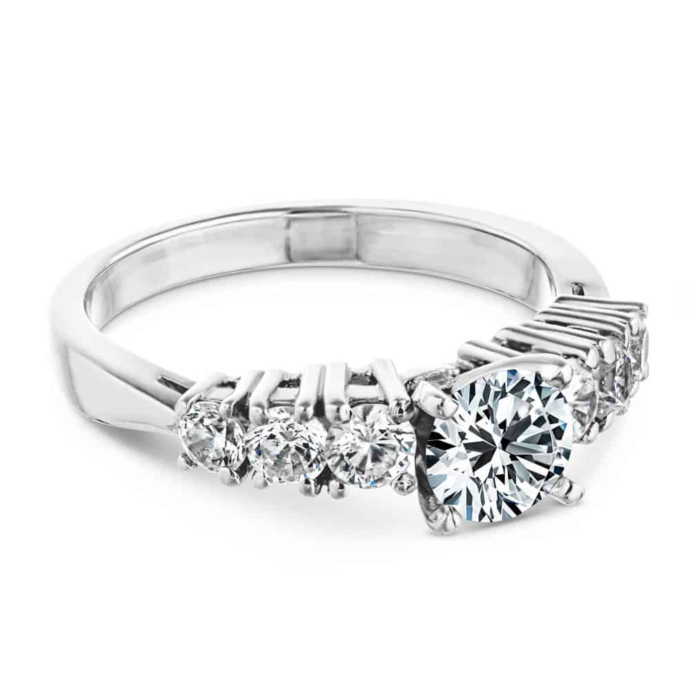 Shown with a 1.0ct Round cut Lab-Grown Diamond with six accenting stones on the band in recycled 14K white gold | engagement ring diamond accented Shown with a 1.0ct Round cut Lab-Grown Diamond with six accenting stones on the band in recycled 14K white gold