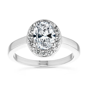 Beautiful conflict free diamond accented halo engagement ring with 1ct oval cut lab grown diamond in platinum band