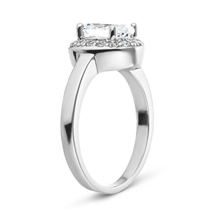 Diamond accented halo engagement ring with 1ct oval cut lab grown diamond in platinum band shown from side