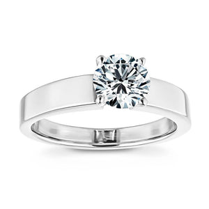 Contemporary sleek solitaire engagement ring with 1ct round cut lab grown diamond in thick 14k white gold setting