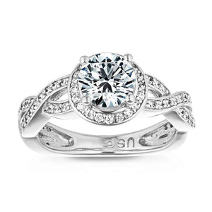 Vintage style diamond accented halo engagement ring with 1ct round cut lab grown diamond in 14k recycled white gold with twisted band design