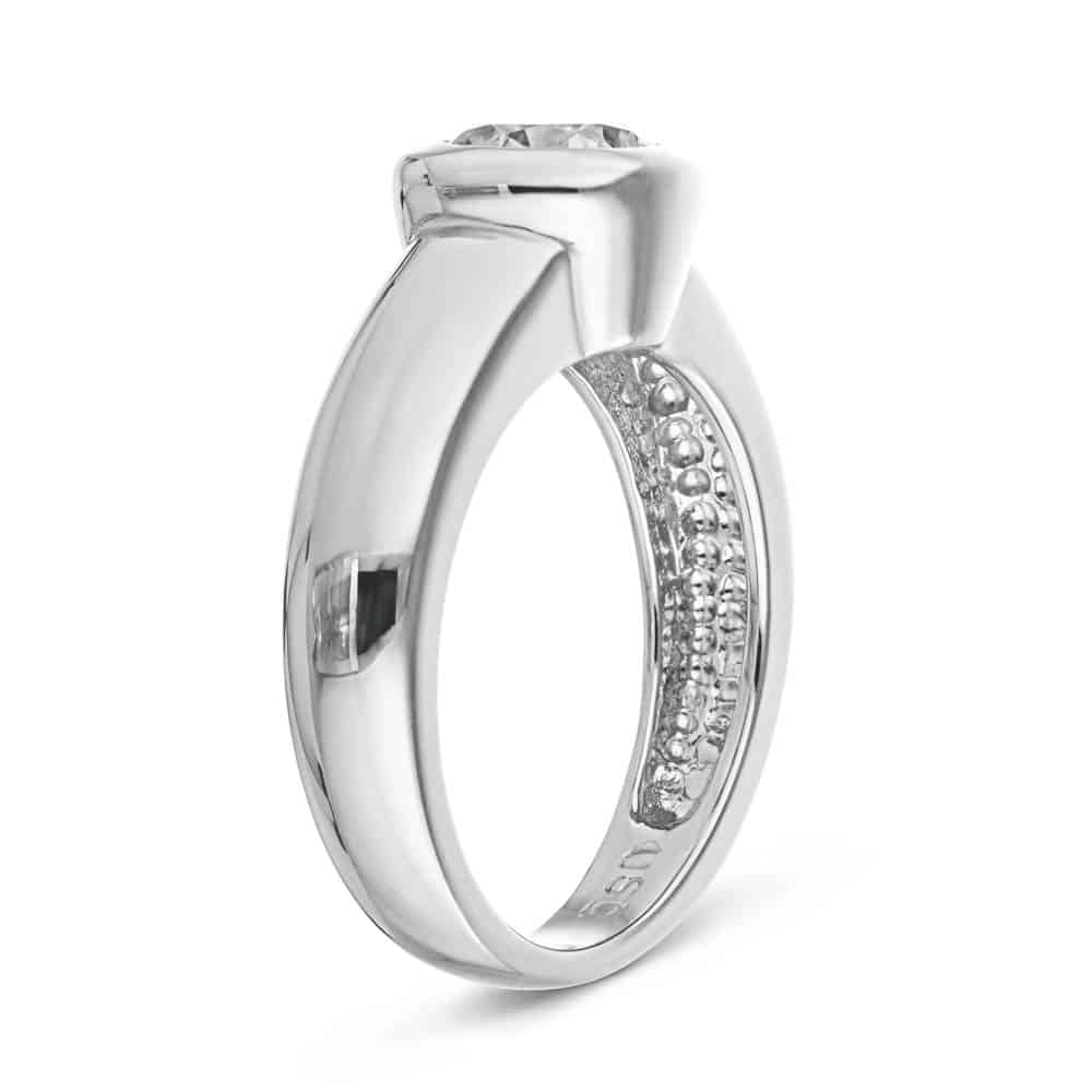 Shown with 1ct Round Cut Lab Grown Diamond in 14k White Gold|Modern minimalistic bezel solitaire engagement ring with 1ct round cut lab grown diamond in thick 14k white gold band