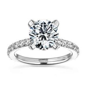 Ethical stunning antique style diamond accented engagement ring with peek-a-boo diamonds under a 1.5ct round cut lab grown diamond in a 14k white gold band