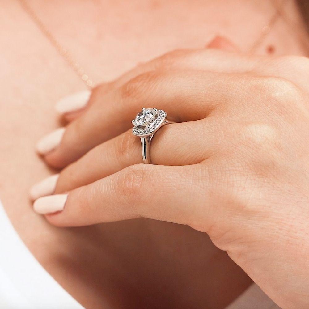 Shown with 1.5ct Round Cut Lab Grown Diamond in 14k White Gold|Unique vintage style cushion shape diamond halo engagement ring with 1.5ct round cut lab grown diamond in 14k white gold band