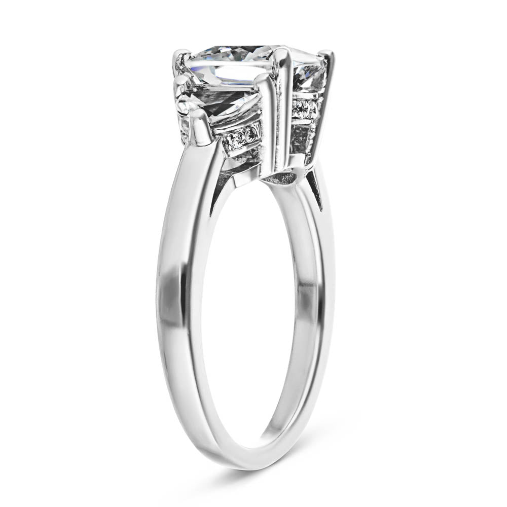 Shown with 2ct Cushion Cut Lab Grown Diamond Center & 0.50ct Moon Cut Side Stones in 14k White Gold|Unique beautiful three stone engagement ring with 2ct cushion cut lab grown diamond center with two moon cut side stones in accented basket style head in 14k white gold setting