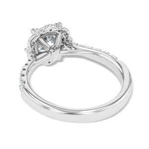 diamond accented halo engagement ring with round cut lab grown diamond center stone set in 14k white gold recycled metal