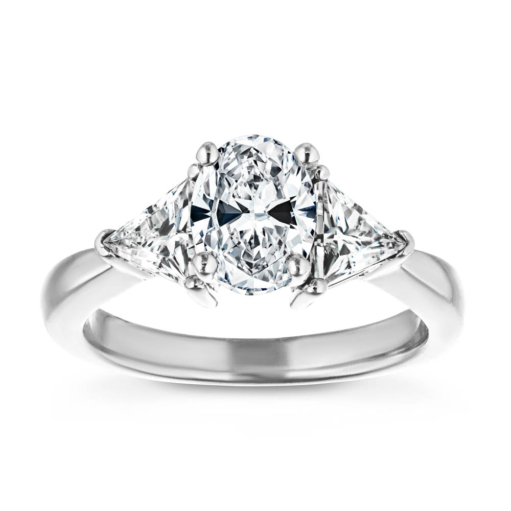Shown with 1ct Oval Cut Lab Grown Diamond &amp; 0.50ct Triangle Cut Side Stones in 14k White Gold