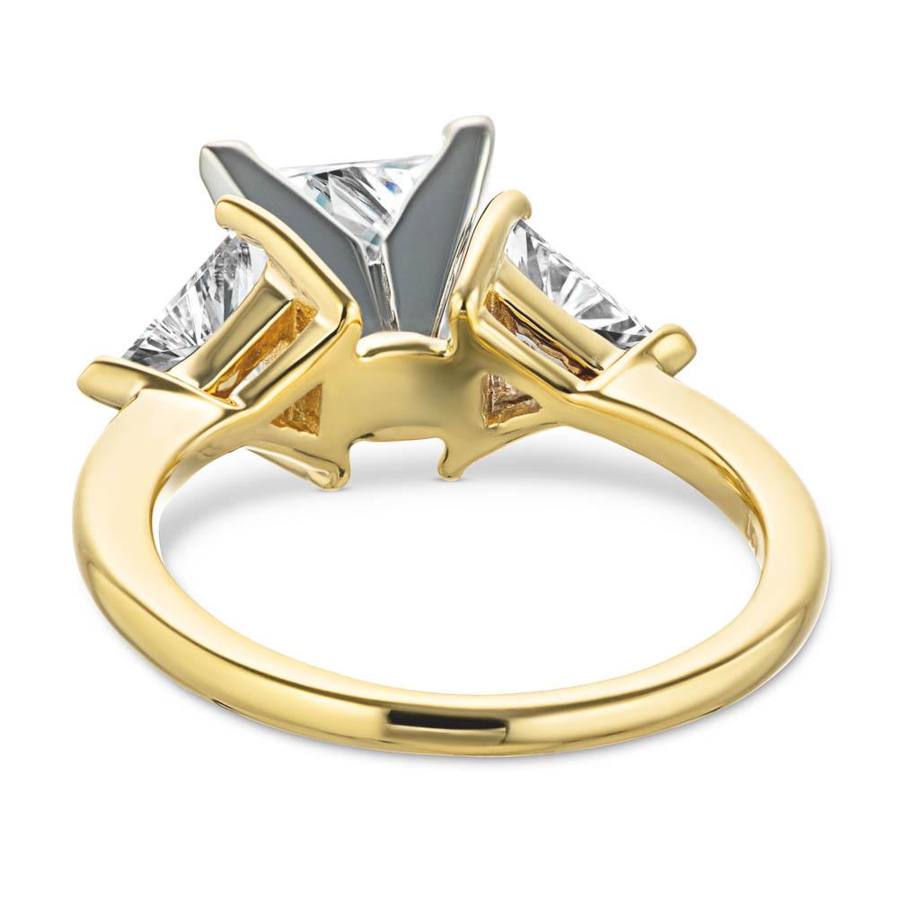 Shown with 1.5ct Princess Cut Lab Grown Diamond &amp; 0.50ct Triangle Cut Side Stones in 14k Yellow Gold