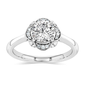 nature inspired diamond halo engagement ring with round cut lab grown diamond center stone set in 14k white gold recycled metal