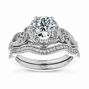  two tone engagement ring Shown with a 1.0ct Round cut Lab-Grown Diamond with diamond accented halo and filigree detailed band in recycled 14K white gold with matching wedding band