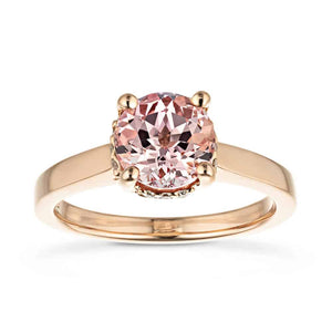 Unique hidden halo engagement ring with 2ct round cut lab created pink sapphire in 14k rose gold band