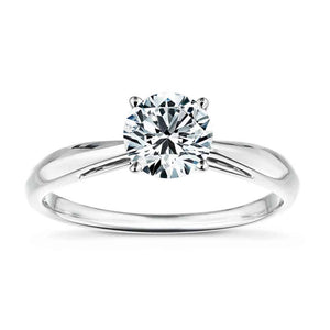 Beautiful ethical solitaire engagement ring with 1ct round cut lab grown diamond in cathedral style 14k white gold band
