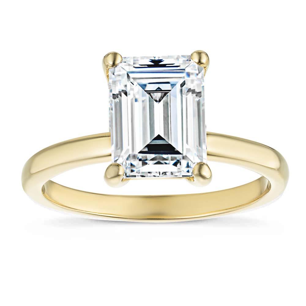 Shown here with a 2.0ct Emerald Cut in recycled 14K yellow gold. 