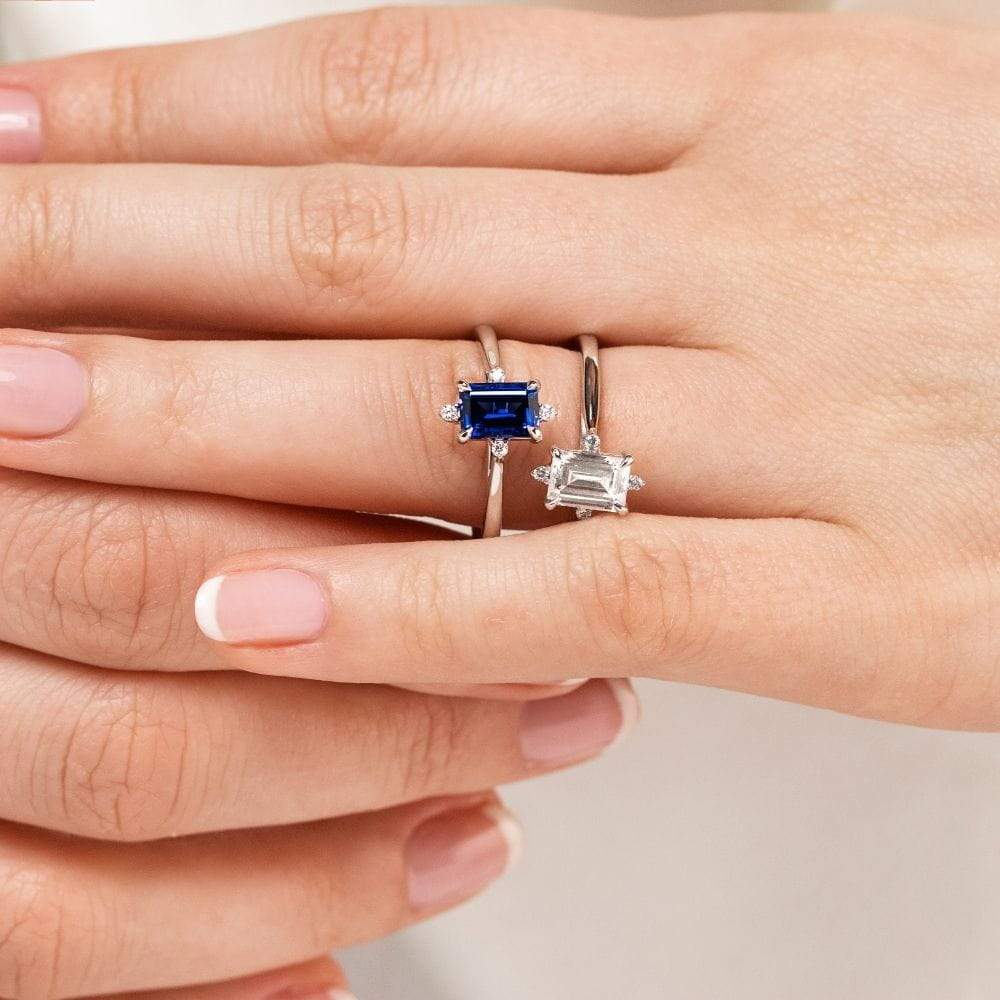Zara Engagement Ring shown with a 1.0ct emerald cut blue sapphire Lab Grown Gemstone and a 1.0ct Lab Grown Diamond, both in in 14K white gold