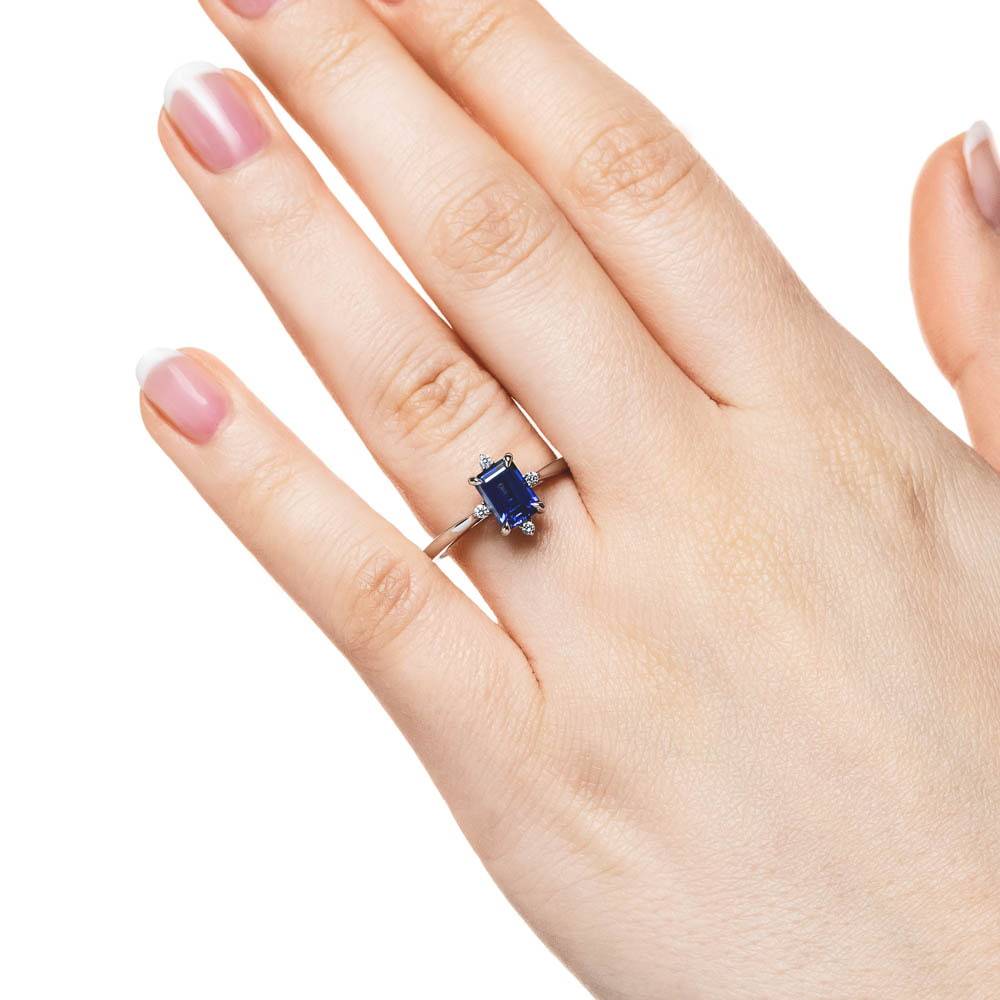 Zara Engagement Ring shown with a 1.0ct emerald cut blue sapphire Lab Grown Gemstone in 14K white gold