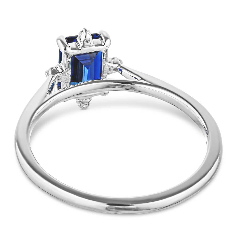 Zara Engagement Ring shown with a 1.0ct emerald cut blue sapphire Lab Grown Gemstone in 14K white gold