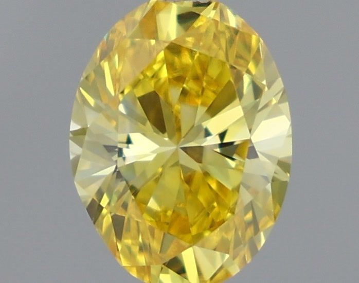 0.55 Carat Oval Shaped, Very Good Cut, FANCY VIVID YELLOW Color, VVS2 Clarity, IGI Certified Lab Grown Diamond