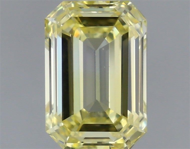 0.71 Carat Emerald Shaped, Very Good Cut, FANCY VIVID YELLOW Color, VVS2 Clarity, IGI Certified Lab Grown Diamond