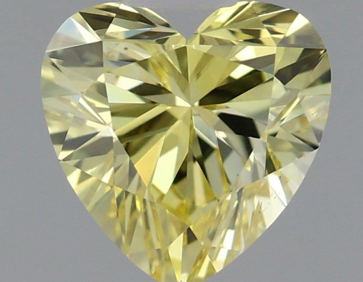 0.52 Carat Heart Shaped, Very Good Cut, FANCY VIVID YELLOW Color, VS1 Clarity, IGI Certified Lab Grown Diamond