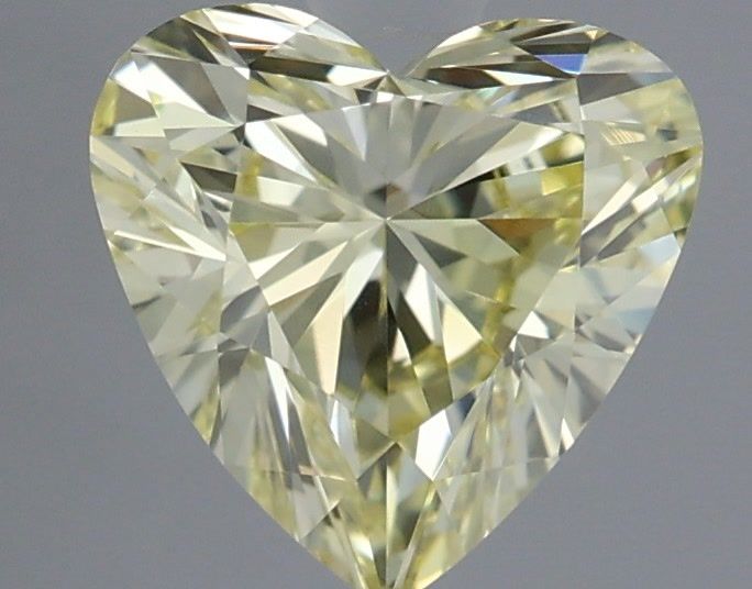 0.76 Carat Heart Shaped, Very Good Cut, FANCY VIVID YELLOW Color, VVS2 Clarity, IGI Certified Lab Grown Diamond