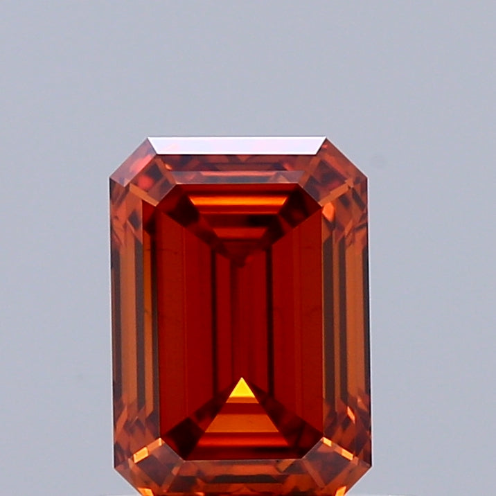 0.97 Carat Emerald Shaped, Ideal Cut, FANCY VIVID ORANGE Color, VS1 Clarity, IGI Certified Lab Grown Diamond
