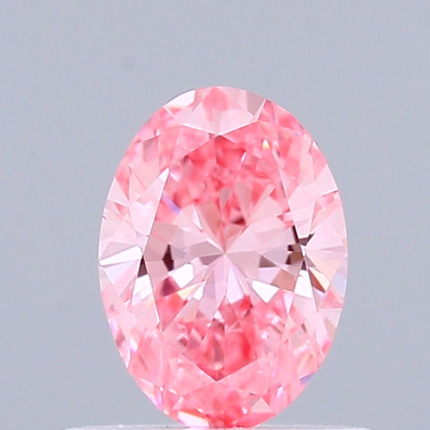 0.52 Carat Oval Shaped, Excellent Cut, FANCY VIVID PINK Color, VVS2 Clarity, IGI Certified Lab Grown Diamond