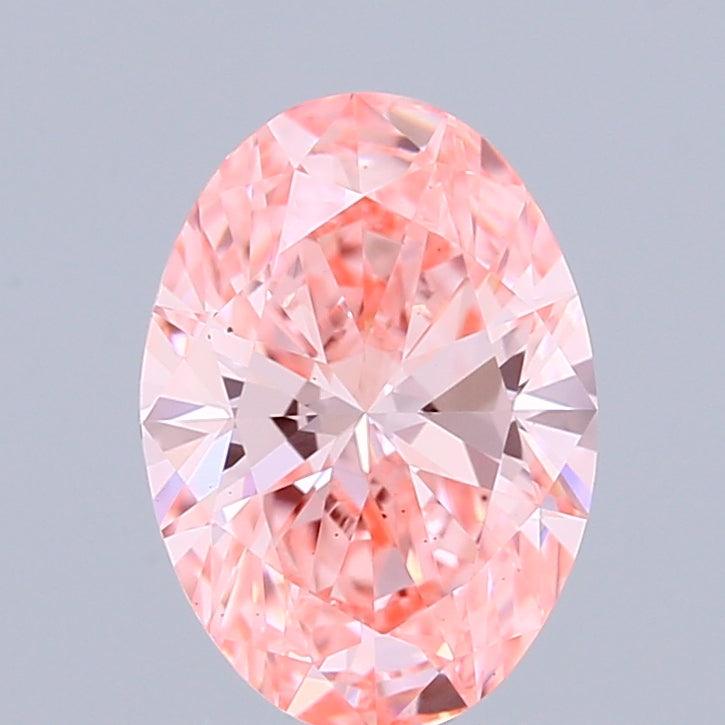 1.06 Carat Oval Shaped, Ideal Cut, FANCY VIVID PINK Color, VS2 Clarity, IGI Certified Lab Grown Diamond