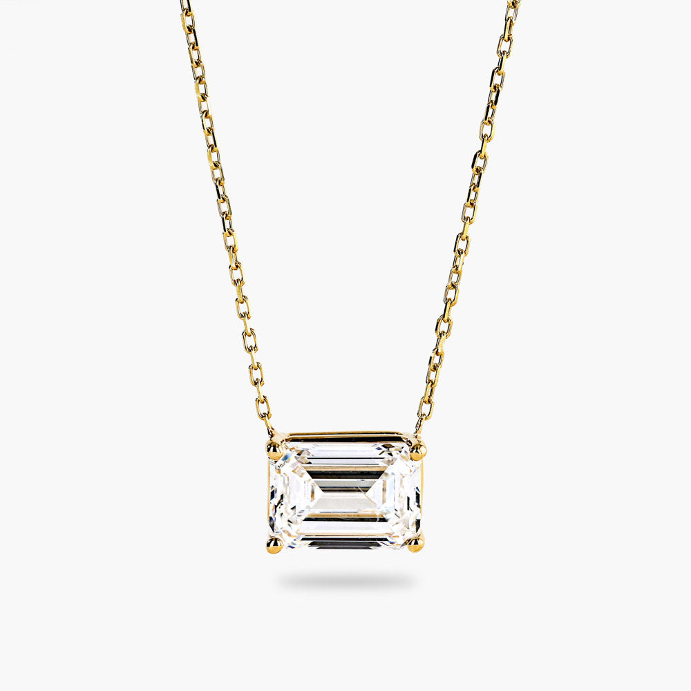 Shown in 14K Yellow Gold|basket pendant featuring an emerald cut lab grown diamond set in recycled yellow gold by MiaDonna
