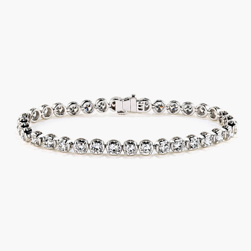 Shown in 18K White Gold|classic tennis bracelet with round cut lab grown diamonds by MiaDonna set in recycled white gold metal