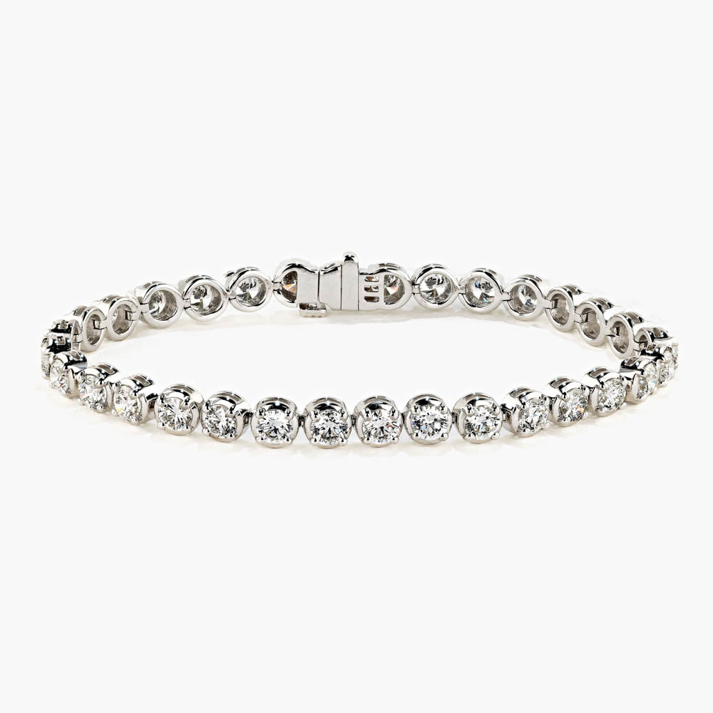 Shown in 18K White Gold|classic tennis bracelet with round cut lab grown diamonds by MiaDonna set in recycled white gold metal