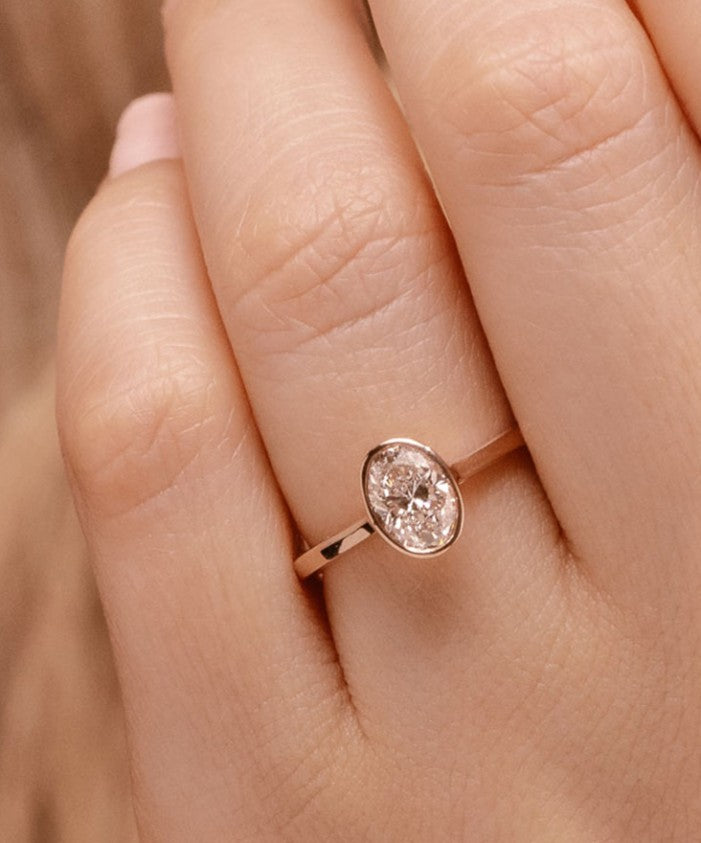 Pear Cut lab grown diamond bezel style engagement ring