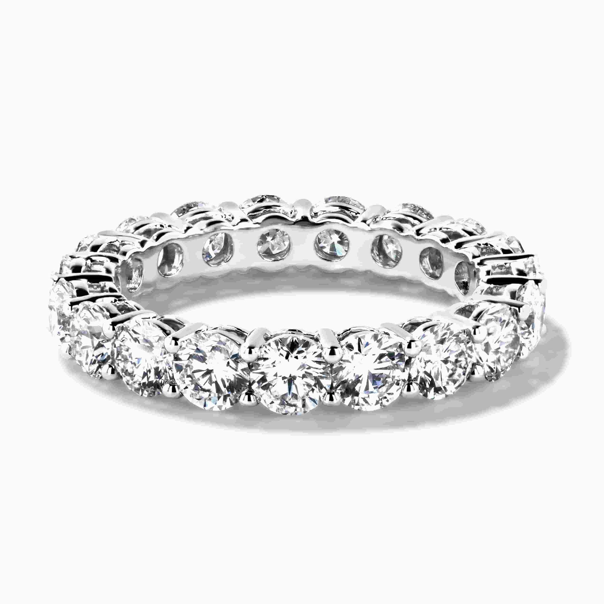 Eternity Lab Grown Diamond Band Shown In 14K White Gold|round cut lab grown diamond eternity band set in recycled white gold metal by MiaDonna