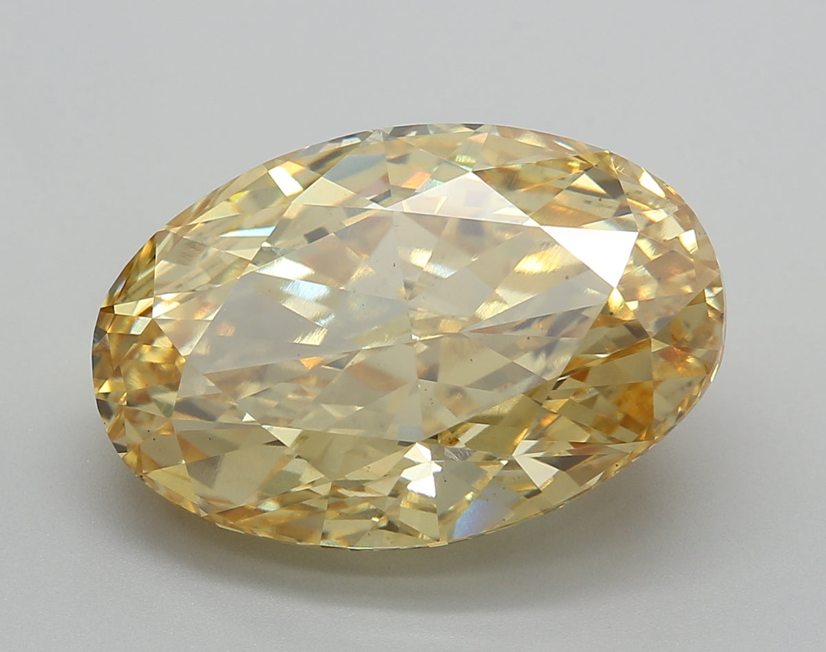 12.05 Carat Oval Shaped, FANCY VIVID YELLOW Color, VS2 Clarity, IGI Certified Lab Grown Diamond