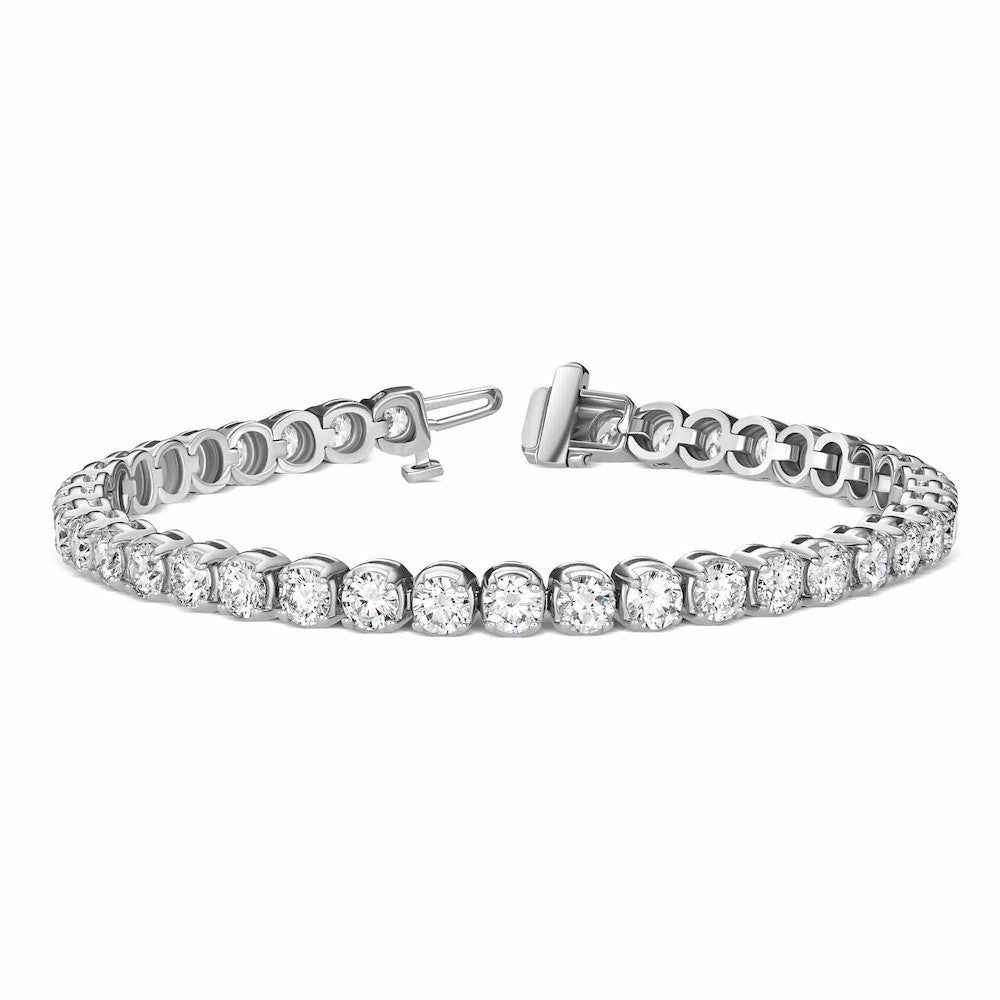 Shown in 14k White Gold with 3ctw Lab Grown Diamonds|3ctw Lab grown diamond tennis bracelet with unique 4 prong design in 14k white gold