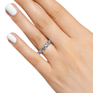 Seven stone wedding ring with bar set lab grown diamonds in 14k white gold shown worn on hand