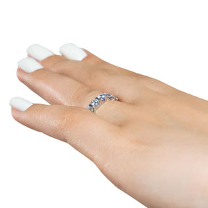 Seven stone wedding ring with bar set lab grown diamonds in 14k white gold shown worn on hand sideview