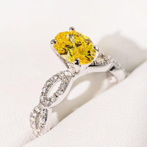 Antique style diamond accented engagement ring with 2ct oval cut fancy color yellow lab created diamond in 14k white gold