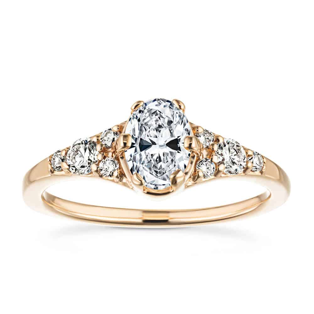 Shown with a 1.0ct Oval cut Lab-Grown Diamond in recycled 14K rose gold with accenting stones