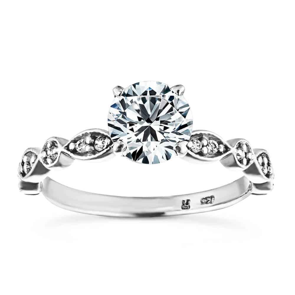 Shown with a 1.0ct Round cut Lab-Grown Diamond in recycled 14K white gold and recycled diamond accenting stones