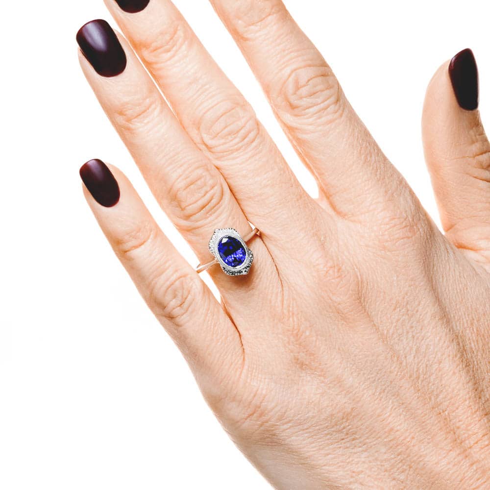 Shown with 2ct Oval Cut Lab Grown Blue Sapphire in 14k White Gold